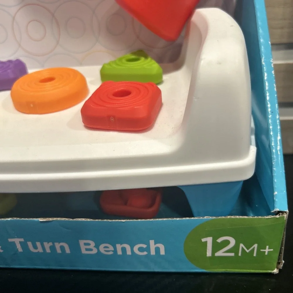Fisher-Price Tap & Turn Bench Pretend Tools 2-Sided Toy for Infants and Toddlers